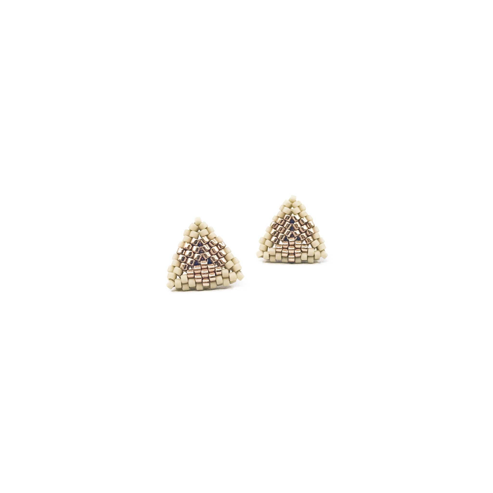 Greige beaded triangle stud earrings with metallic center detail, gray beige tone beads, front view.