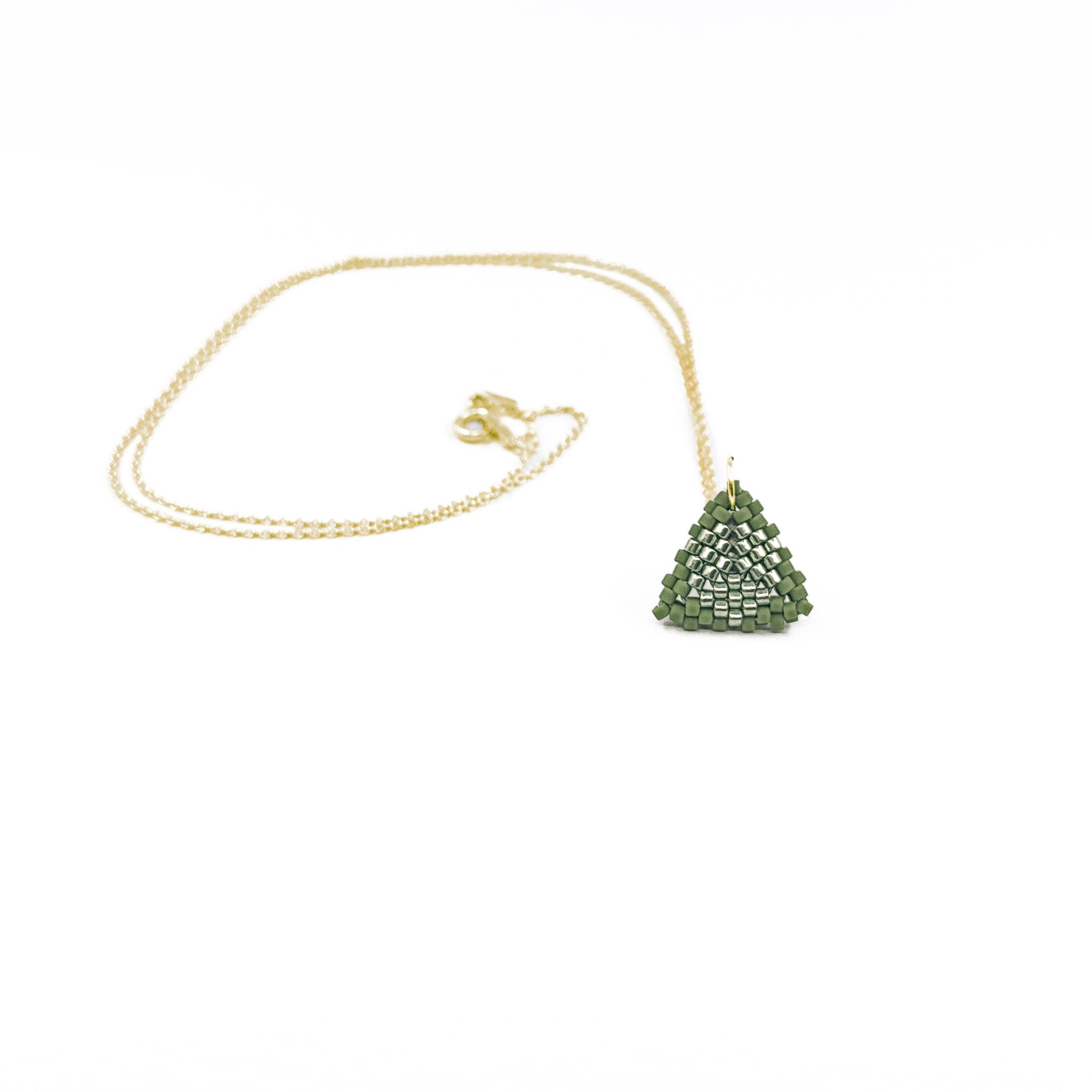 Green beaded triangle pendant on a gold chain with metallic center detail, moss green beads, front view.